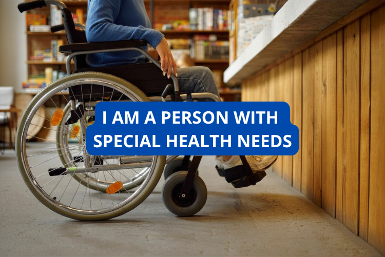 Photo of a person in a wheelchair at the counter